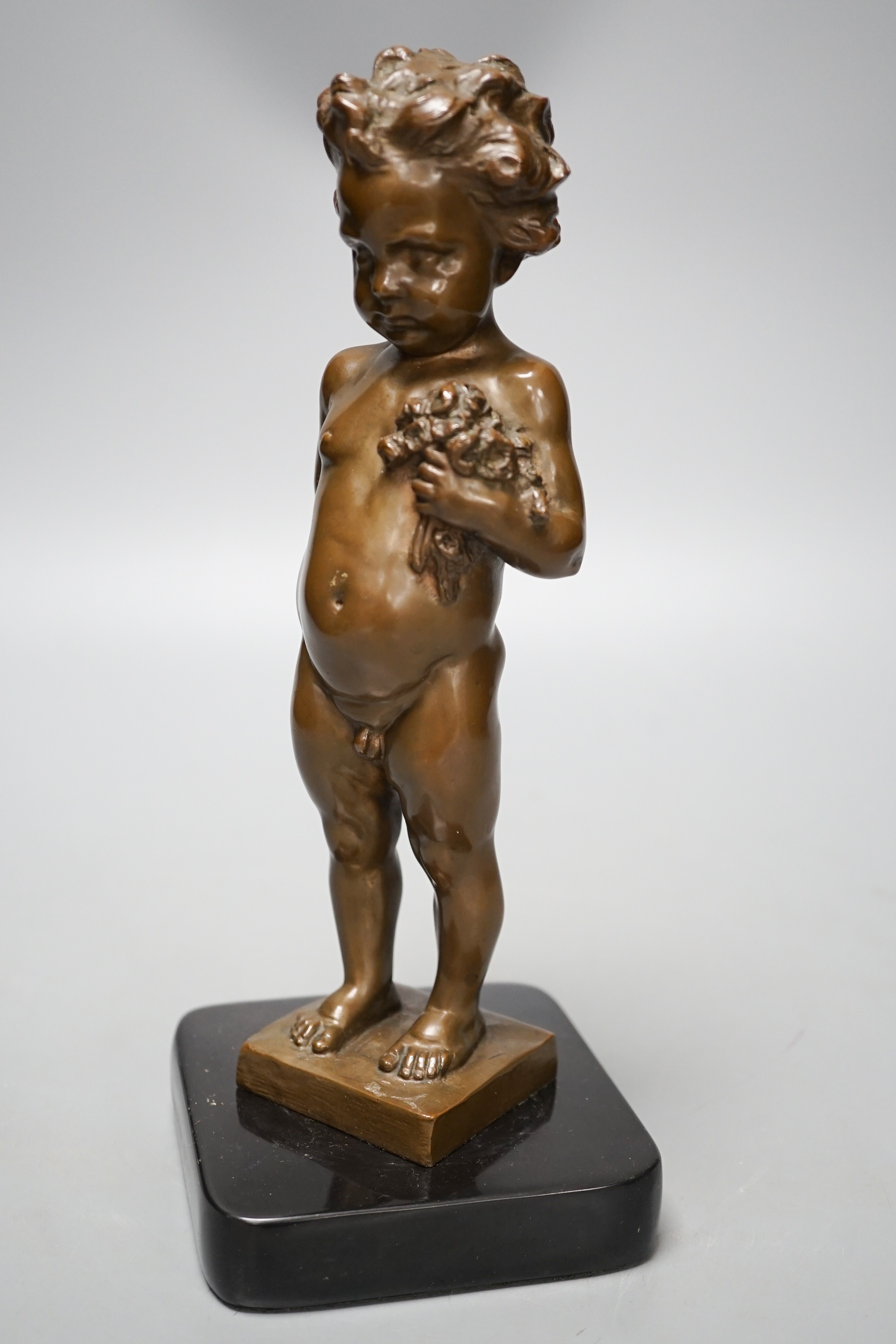 A bronze of a putto holding flowers, signed ‘M.Müller’ 25cm - Image 2 of 5