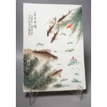 A Chinese famille rose porcelain rectangular plaque, Republic period (1912-49), painted with fish in