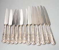 A set of six modern silver handled steel Kings pattern table knives and six matching dessert knives,