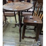 A 19th century oak stool and an oak tripod table, table diameter 53cm, 70cm height