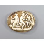 A yellow metal mounted antique oval cameo shell brooch, carved with classical figures, 4cm.