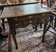 An 18th century oak lowboy. W-74cm, D-49cm, H-70cm.