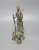 An Indian bronze figure of a standing Buddha, 25cm