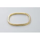 A 9ct gold bangle, interior diameter 59mm, 10 grams.