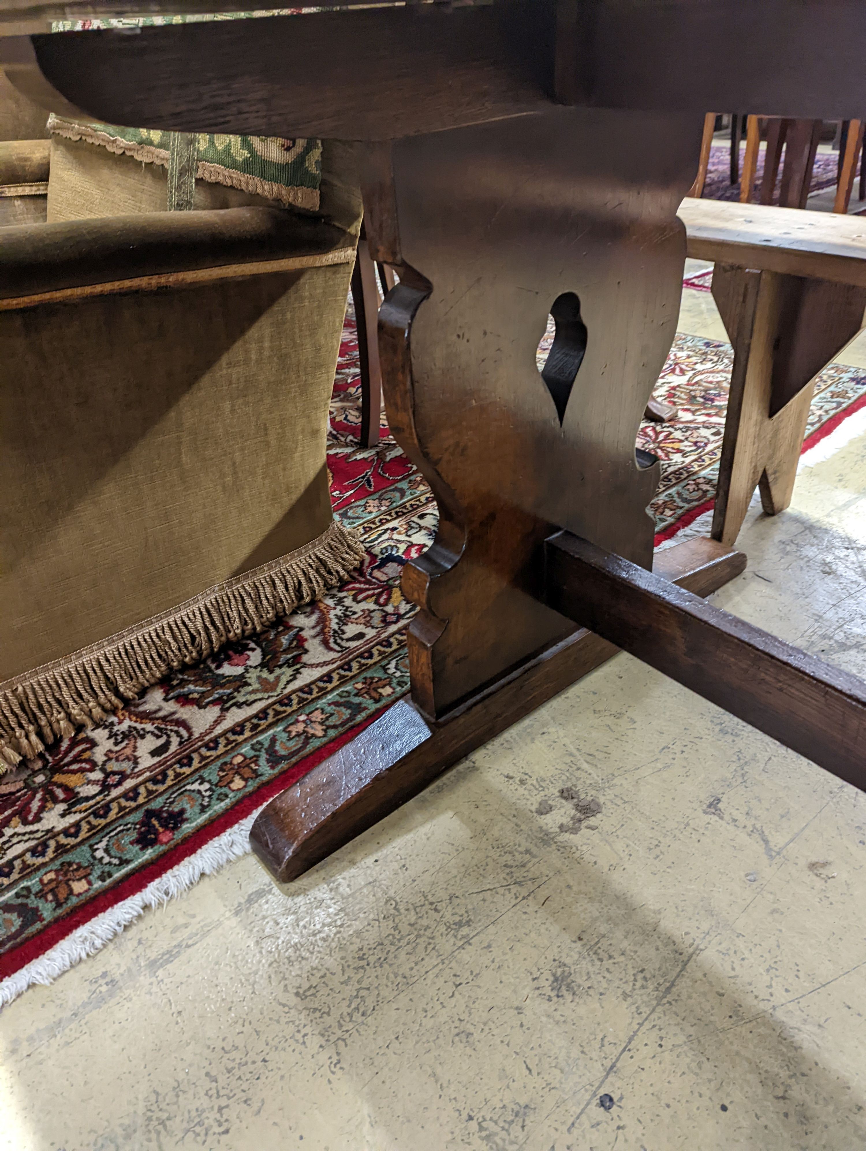 A Liberty oak refectory table, W-214cm, D-91cm, H-76cm. - Image 6 of 6