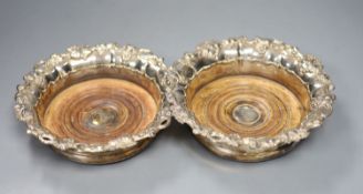 A pair of 19th century plated wine coasters. 17cm