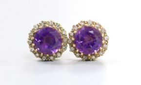 A pair of 9ct gold, amethyst and diamond chip set circular cluster ear studs (lacking