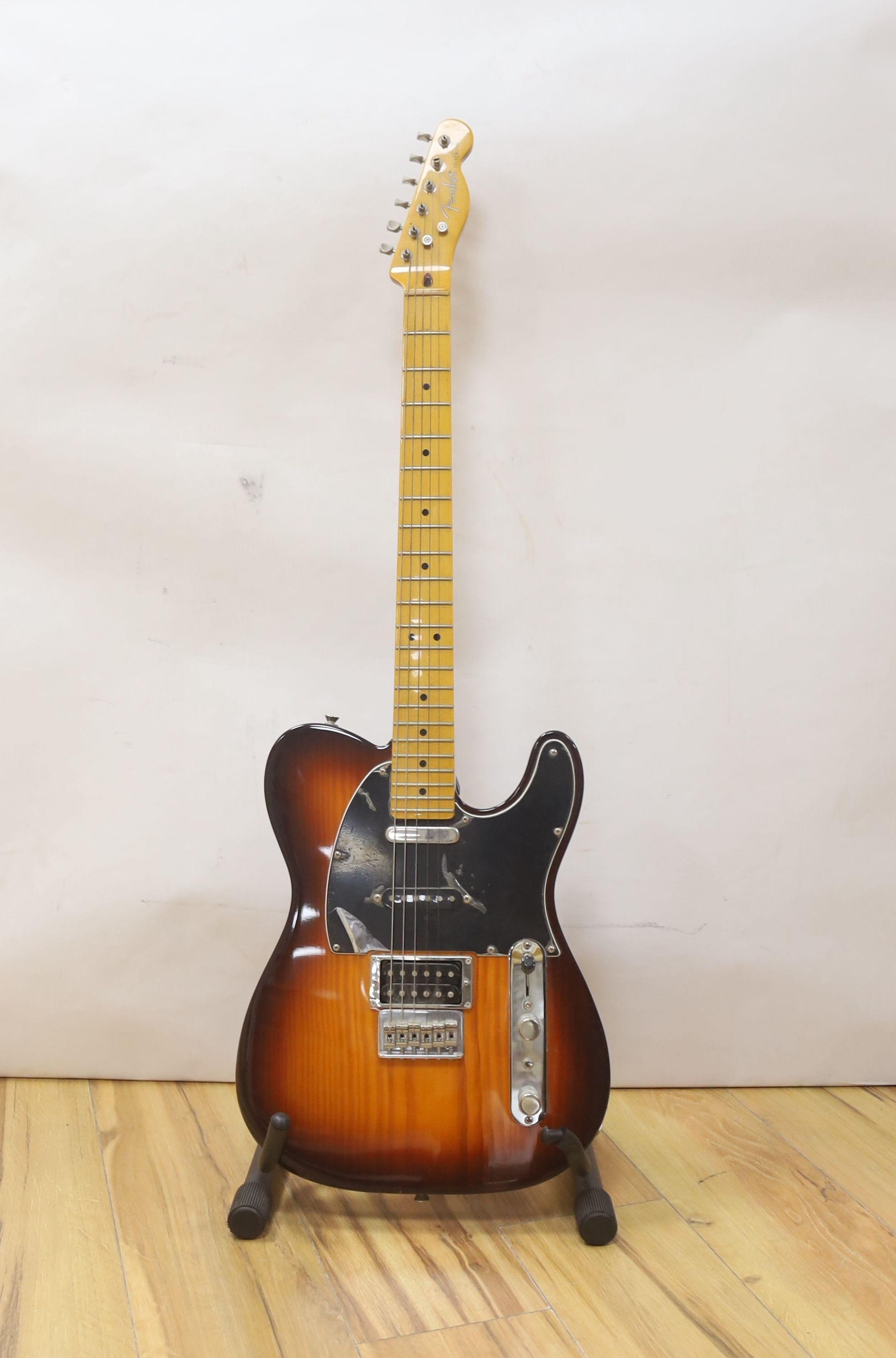 A Fender Telecaster guitar. Serial number CGF1314464