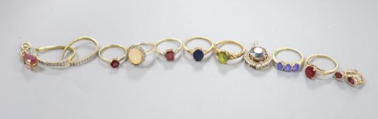 Six assorted modern 9ct gold and gem set dress rings, a pair of 9ct and gem set earrings and two 9ct