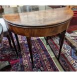 A George III mahogany demi lune tea table. W-90, D-44, H-73cm.