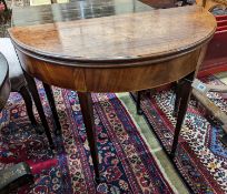 A George III mahogany demi lune tea table. W-90, D-44, H-73cm.