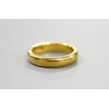 A 1930's 22ct gold wedding band, size K/L, 6.9 grams.