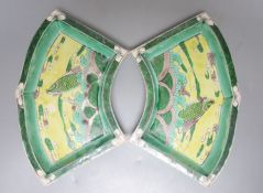 A pair of Chinese famille verte biscuit fan-shaped sweetmeat dishes, Kangxi, 20 cms wide.