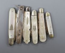 Five assorted early 20th century mother of pearl mounted silver fruit knives and a silver mounted