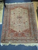 A North West Persian camel ground rug. 170x130cm.