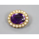 A late Victorian yellow metal, amethyst and split pearl set oval brooch, 28mm, gross weight 10.3