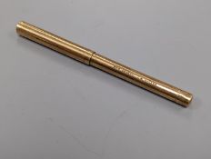 A 9ct gold “swan pen” pen engraved ‘BRIG. GENERAL. J.W. WALKER. IRVINE’