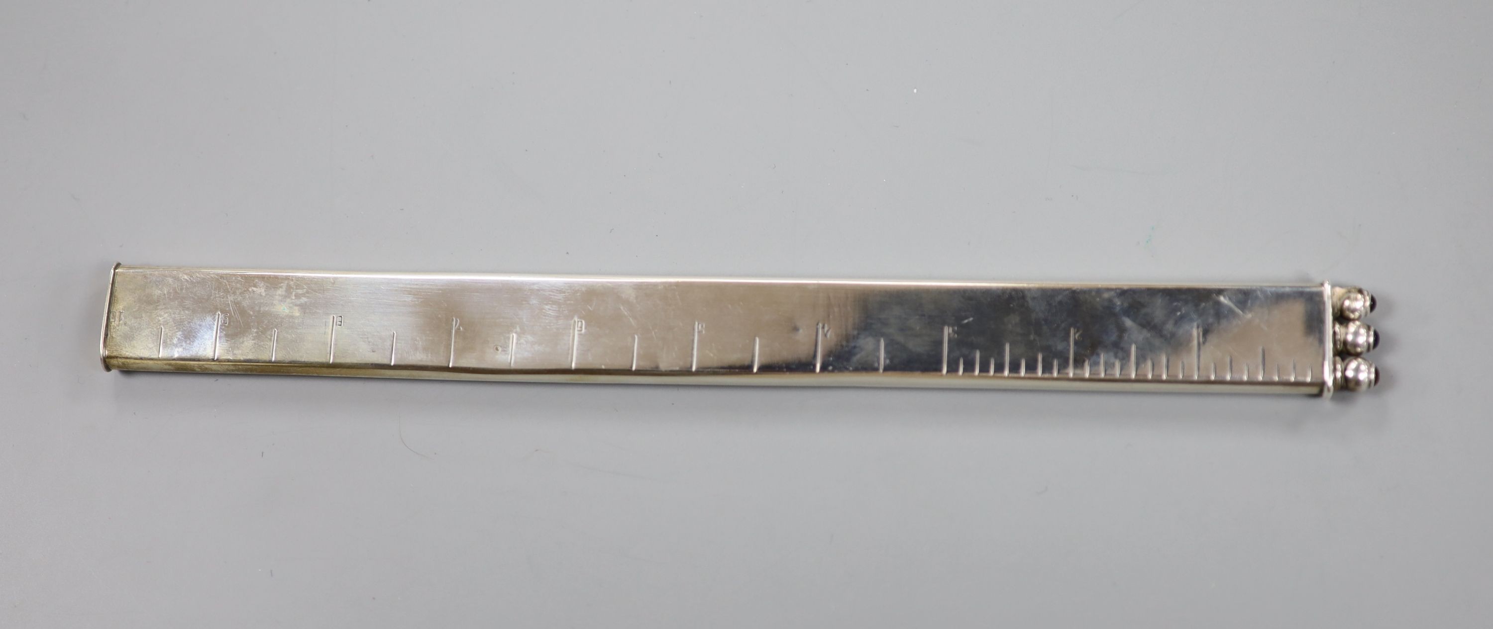 A late Victorian silver ruler and triple pen set, import marks for Heinrich Levinger, Birmingham,