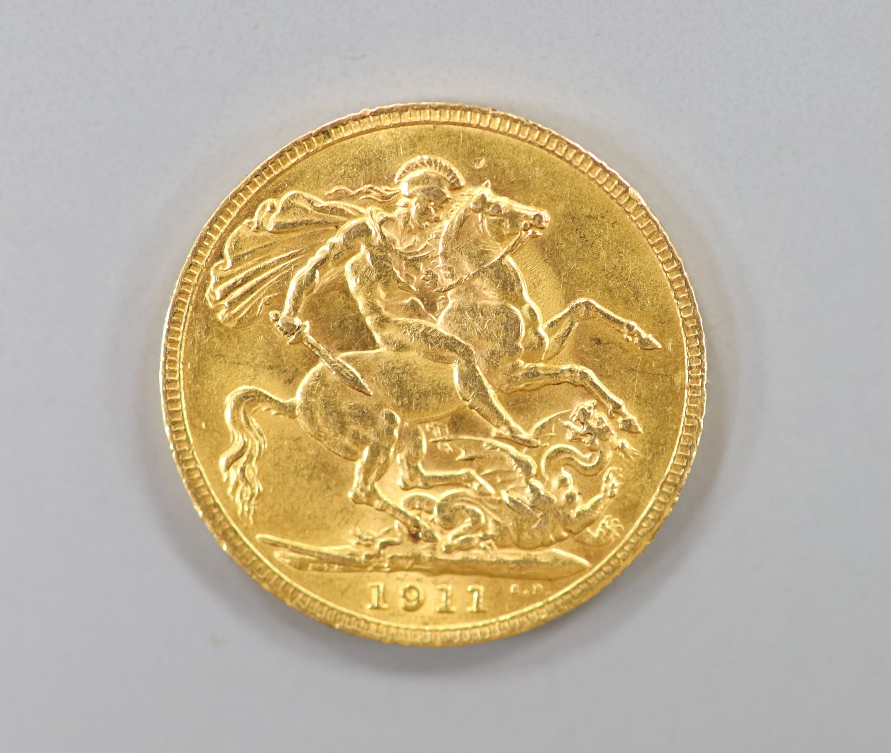 A George V 1911 gold sovereign. - Image 2 of 2