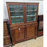 A 19th century Continental mahogany glazed side cabinet, width 116cm, depth 40cm, height 166cm