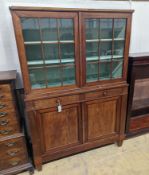 A 19th century Continental mahogany glazed side cabinet, width 116cm, depth 40cm, height 166cm