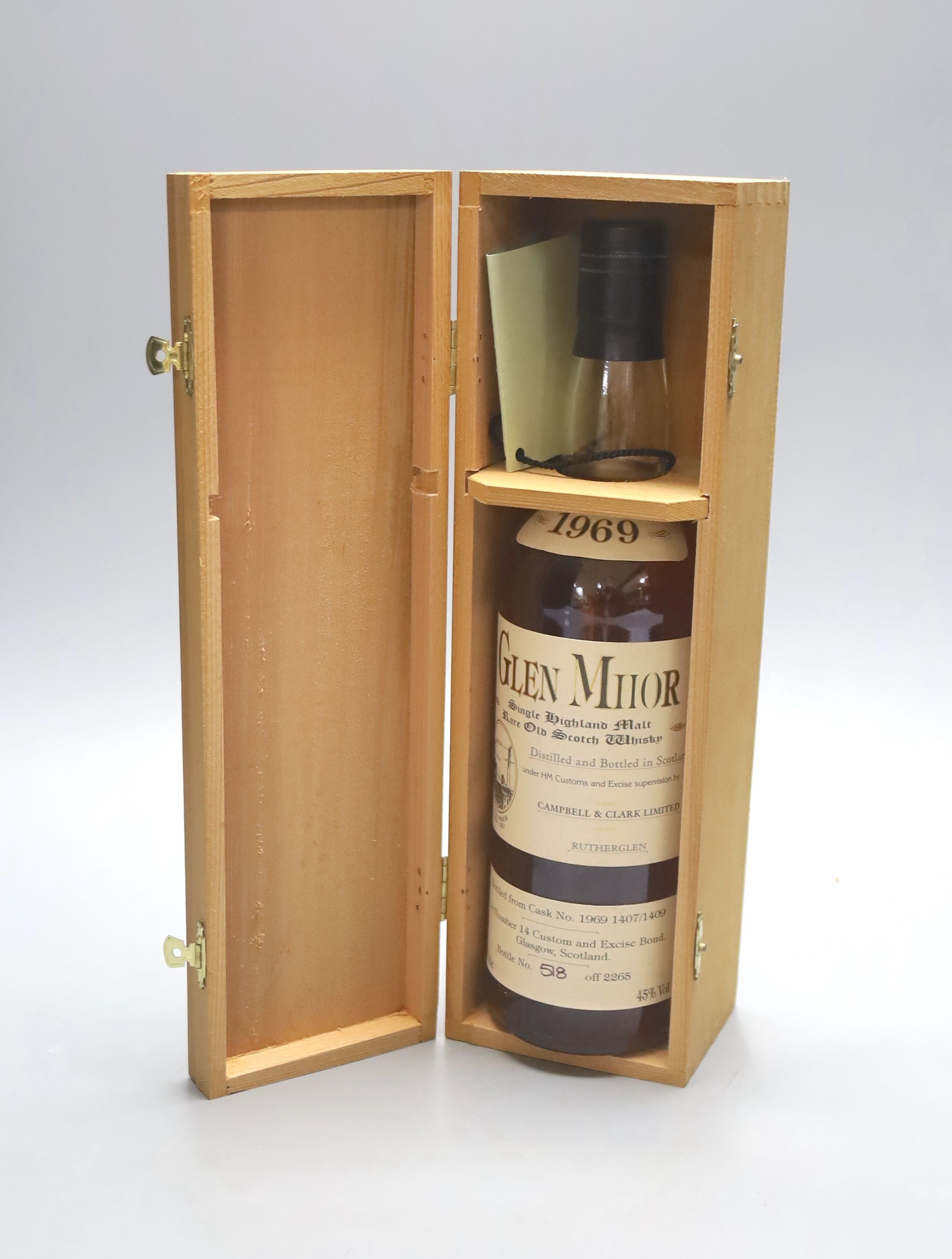 A bottle of Glen Mhor 1969 single Highland malt whisky, no. 518 off 2265, in wooden presentation