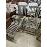 A pair of weathered teak garden steamer chairs, one lacks foot piece. H-93cm.