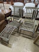 A pair of weathered teak garden steamer chairs, one lacks foot piece. H-93cm.