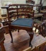 A Georgian style mahogany pad foot corner chair. H-80cm.