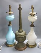A pair of Victorian Opaline glass table lamps, 55cm high and archaistic brass table lamp