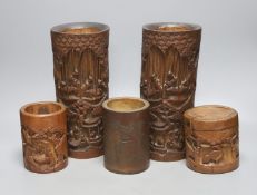 Four Chinese bamboo brushpots and a caddy, tallest brush pot 29 cms high.