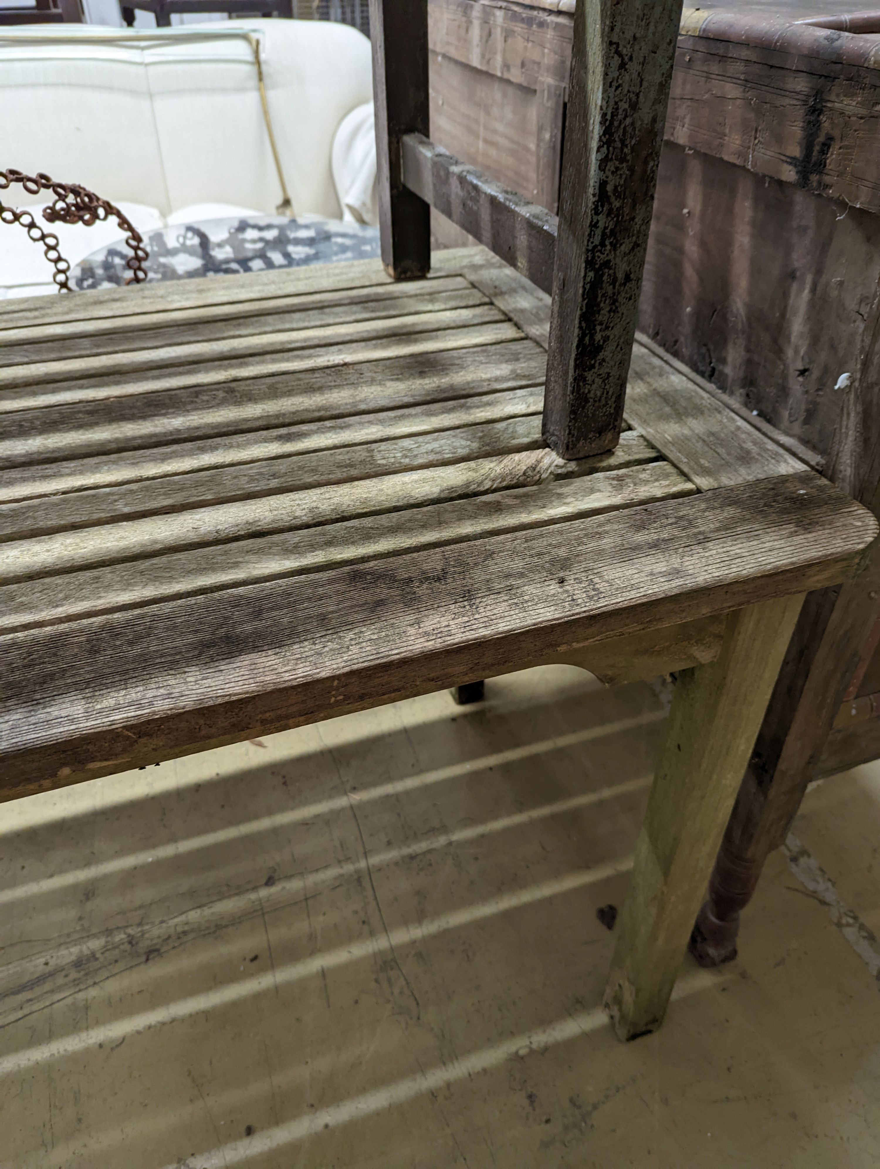 A weathered teak garden bench and rectangular table. Bench - W-122cm, D-54cm, H-83cm. Table - W- - Image 5 of 7