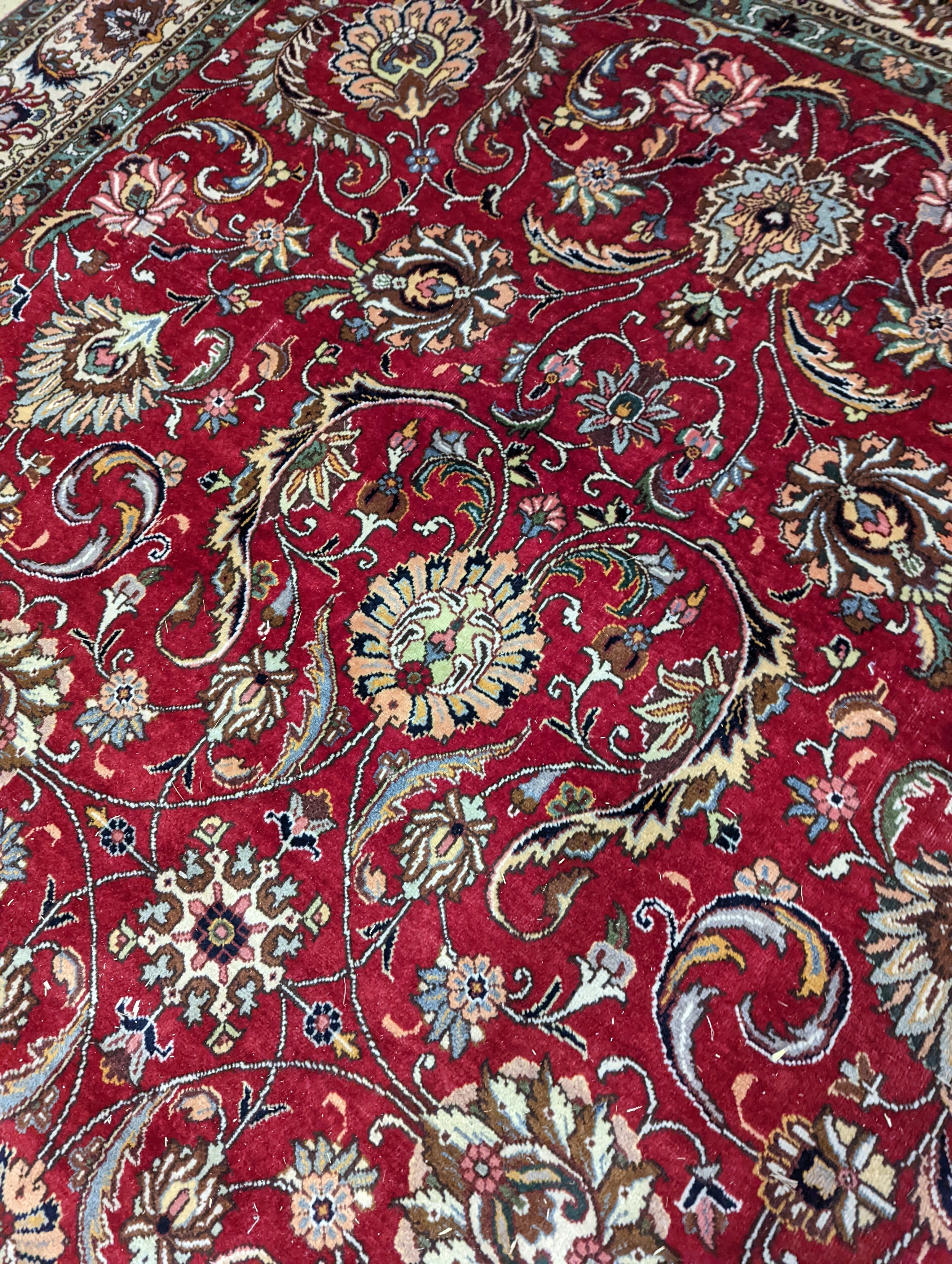 A Tabriz red ground carpet, 400 x 290cm - Image 7 of 13