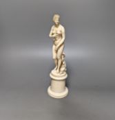 A 19th century Dieppe ivory figure after the antique ‘Venus with dolphin’ 25cm