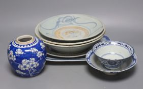 Two 19th century Chinese blue and white dishes and various jars and brush pots, largest item meat