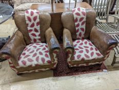 A pair of leather and fabric club armchairs. H-80cm.