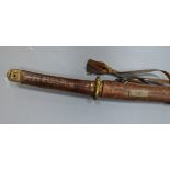 A Japanese Katana with leather covered sheath, plaque reading ‘Presented to Capt. S. Mear Telecoms