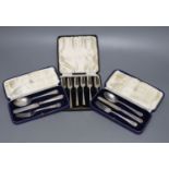 A cased set of six Art Deco silver cake forks, Sheffield, 1936 and two cased silver christening