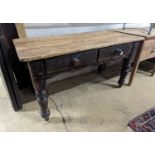 A Victorian pine two drawer kitchen table. W-133cm, D-66cm, H-73cm.
