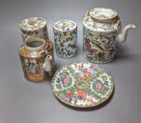 A group of 19th/20th century Chinese famille rose tea pots, plates, boxes and covers and a dish