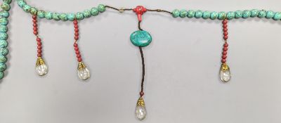 A Chinese turquoise matrix court style necklace in a hardwood box