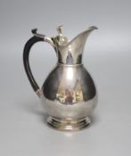 A late Victorian silver hot water jug, London, 1898, 19.2cm gross 14oz.