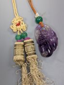 A 19th century Chinese carved amethyst pendant, 5cm on an ornate cord