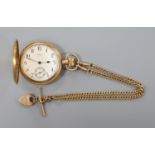 A 9ct gold albert, 44cm, 31.7 grams, together with a gold plated Waltham hunter pocket watch.