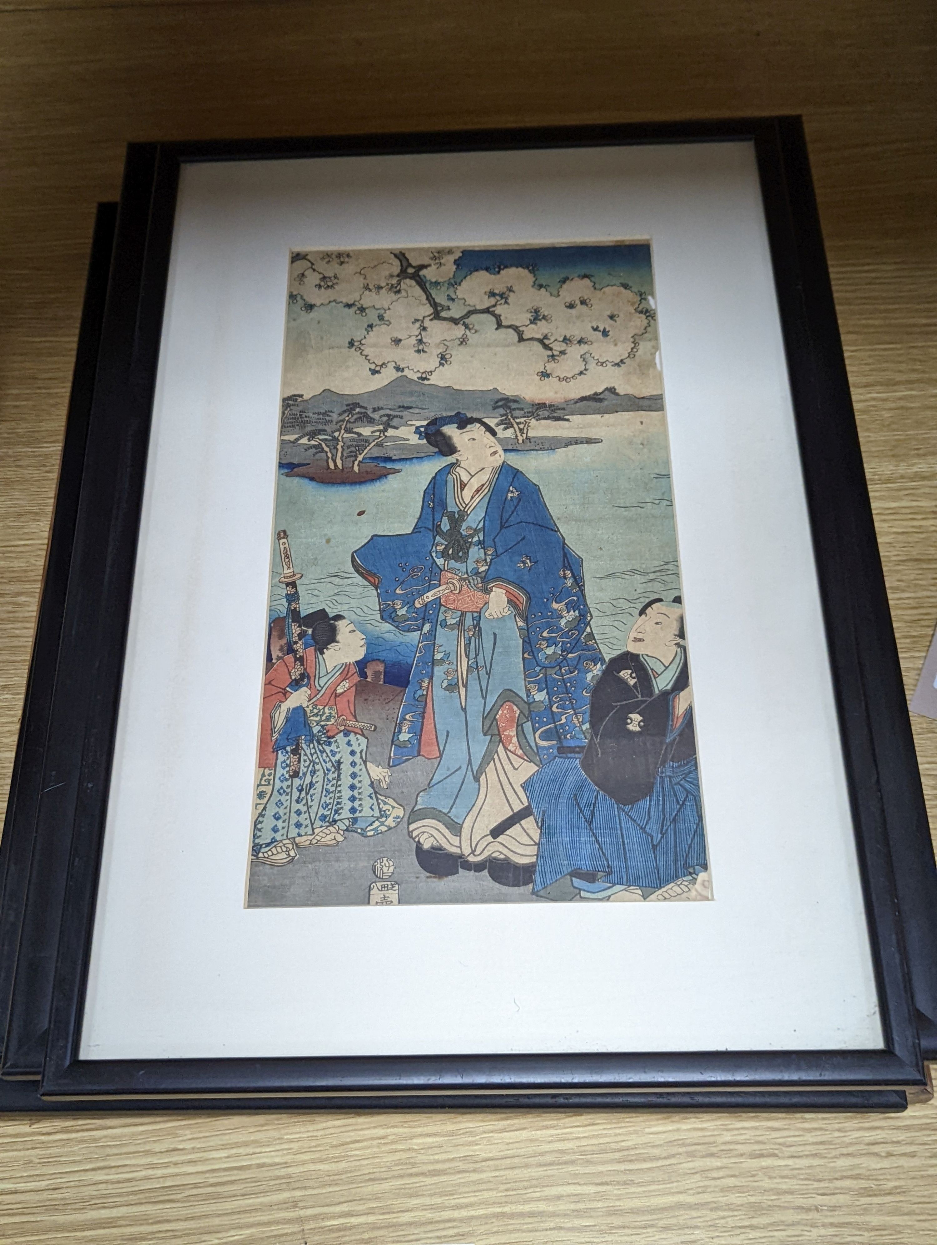 Toyokuni III (1786-1864), wood cut print, 'Prince Genji and his pages', 34 x 18cm, a study of a