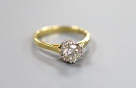 A modern 18ct gold and solitaire diamond ring, the stone weighing approx. 1.03ct, size O, gross