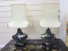 A pair of mid 20th century Chinese hardstone tripod censers on lamp stands, including stand 30 cms