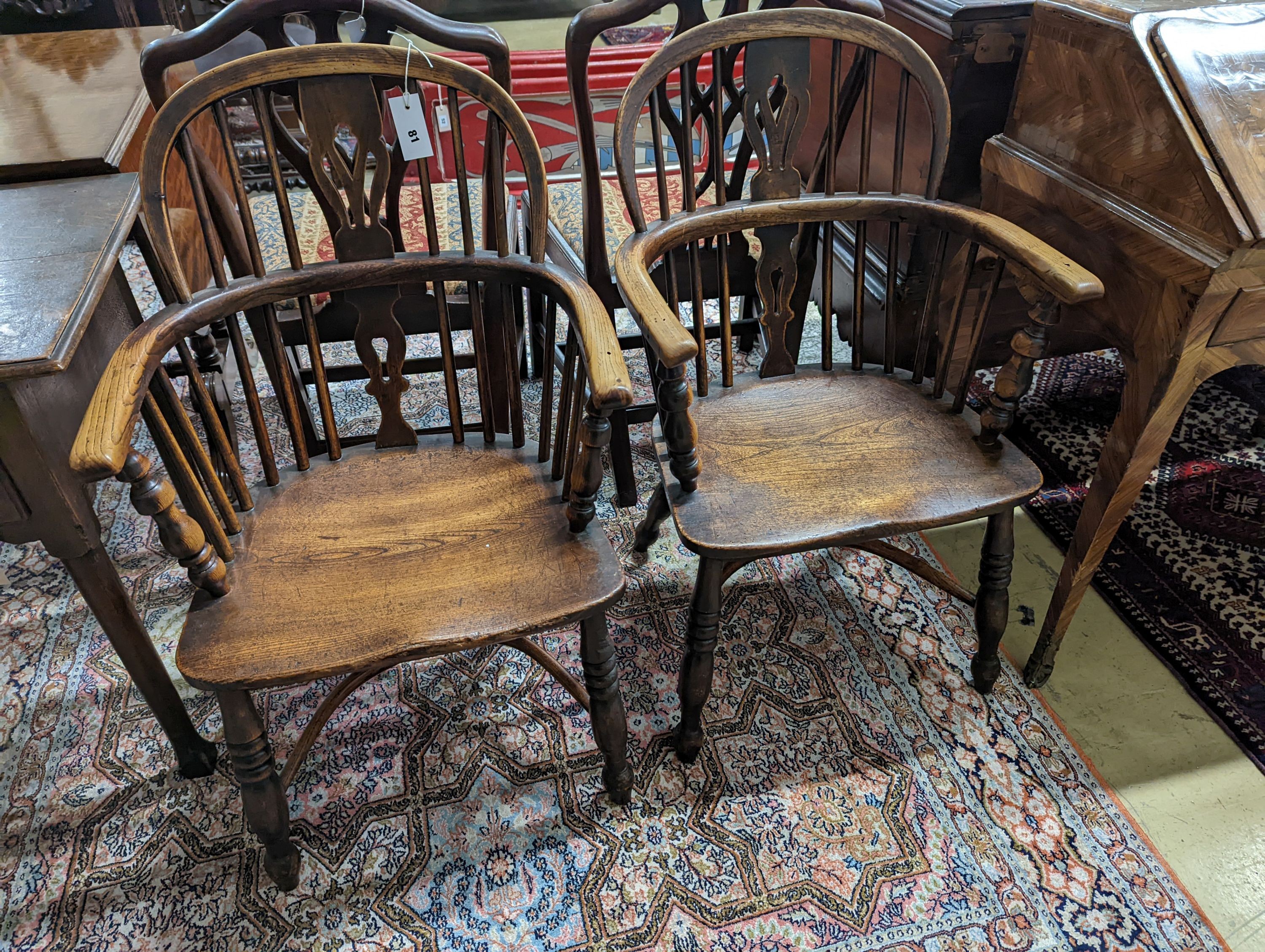 A pair of early 19th century ash and elm Windsor chairs. H-87cm.