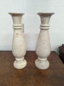 A pair of travertine marble vases. H-40cm.