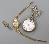 A lady's yellow metal manual wind wrist watch, on a gold plated bracelet, together with a silver fob